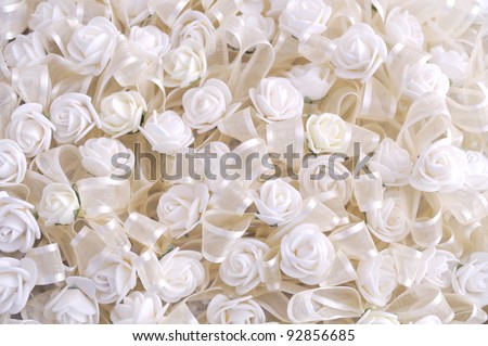 Wedding background of white flowers. small satin roses