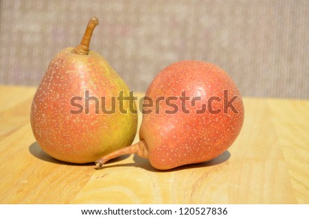 Ripe and ready to eat pears on an outdoor table