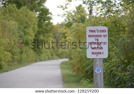 Trail closed sign on a rural Michigan, USA nature trail