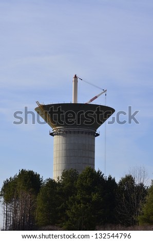 Water storage tower under construction in a rural Michigan community