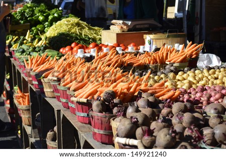 A variety of fresh vegetables for sale at a local market