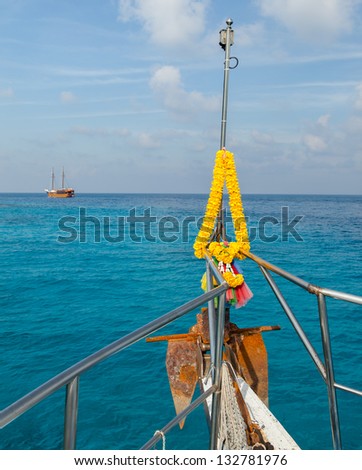 Dive boat at similian Islands, Thailand. Flower decorated bow.