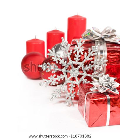 Christmas decorations : candles , gifts and balls Isolated on white