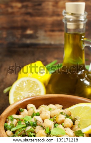 dish of chickpeas with mint, olive oil and lemon sauce