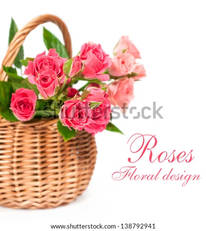 bouquet of pink roses in a basket isolated on white