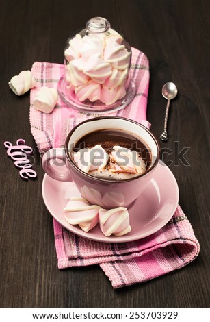 hot chocolate in pink cup with marshmallows