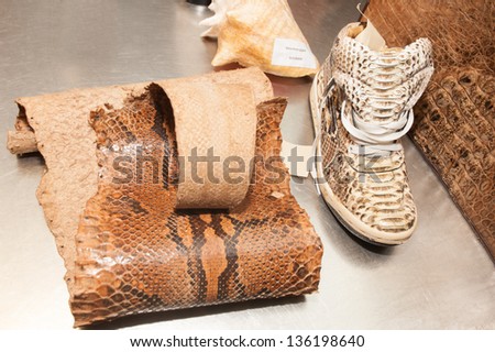 LJUBLJANA, SLOVENIA - APRIL 20: Forbidden merchandise made out of protected piton skin, confiscated by Slovenian Customs, shown on Ljubljana Airport on April 20, 2013.