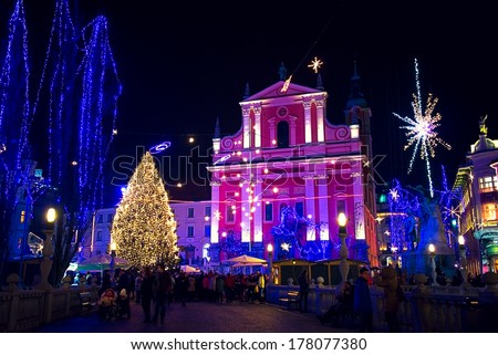 LJUBLJANA, SLOVENIA - DECEMBER 30: Preseren square in festive lightning in December for Christmas and New Year\'s eve celebration with entertainment program. Ljubljana, Slovenia, on December 30, 2013.