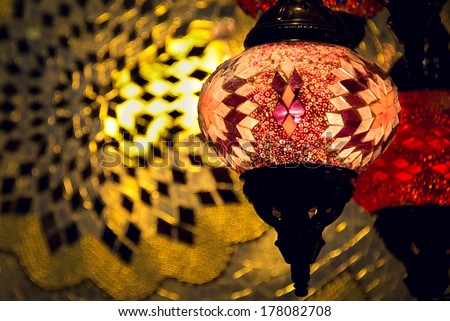 Colorful arabic lamp with bright light in background. Concept for arabic, islamic culture and design.