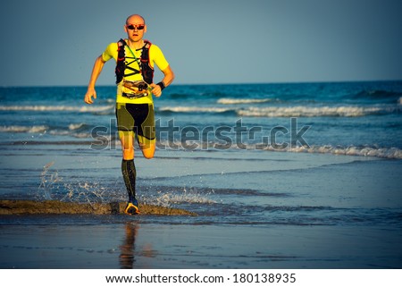 SOUTH OMAN - JANUARY 30: Italian runner Ivan Zufferli running at finish of extreme endurance marathon Transomania 2014. Marathon is with 300 km in mountains and desert one of the hardest ever made.