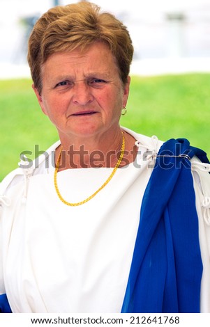 LJUBLJANA, SLOVENIA - AUGUST 24, 2014: Unidentified woman dressed in typical Roman toga, in Ljubljana, on August 24 2014, 2000 years of Roman Emona.