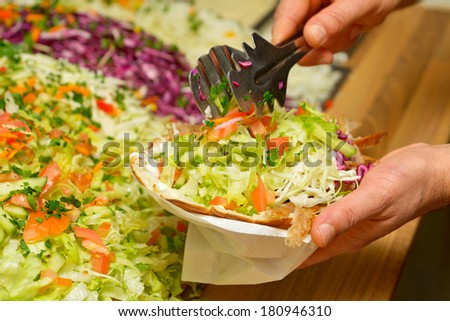 Doner kebab with salad making