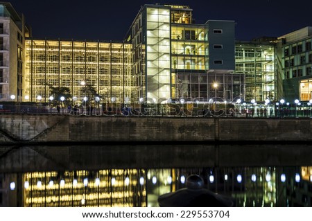 BERLIN, GERMANY - November 8, 2014 Lights border of illuminated balloon wall in Germany celebration of the people of the 25th anniversary of the fall of the Wall in Berlin near Reichstag and Spree