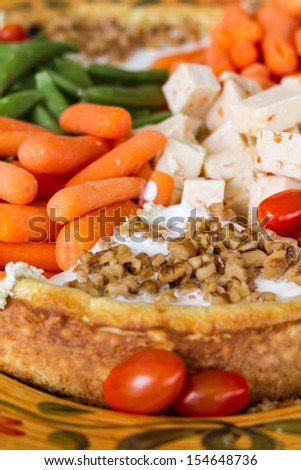 Vegetable and cheese hors d\'oeuvre platter with Brie cheese