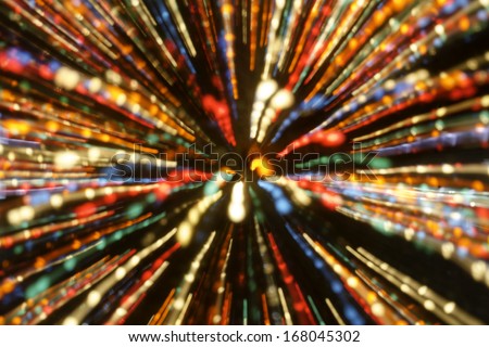 Abstract light streaks of background of multi colored Christmas lights