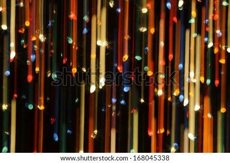 Abstract light streaks of background of multi colored Christmas lights