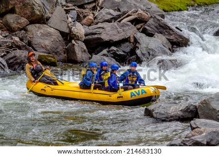 CLEAR CREEK, COLORADO/U.S.A. - August 31, 2014: Late season white water rafting adventure continues on the Clear Creek River just 30 minutes from Denver on August 31, 2014 in Clear Creek, Colorado