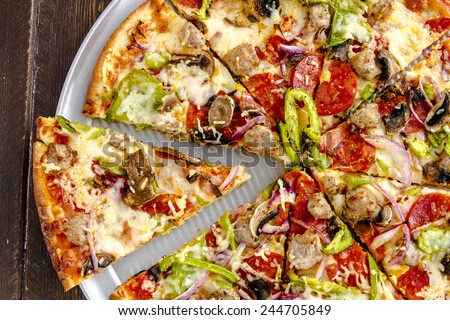 Fresh baked thin crust supreme pizza with fresh mushrooms, onions, green peppers, tomato sauce, pepperoni, sausage and cheese