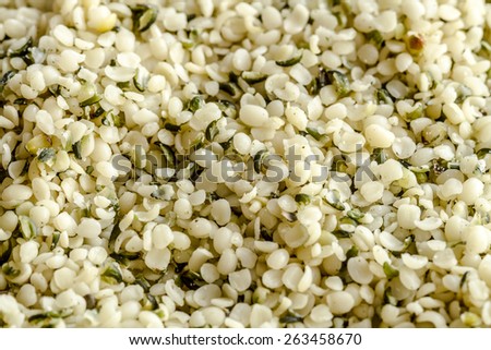 Close up of organic hemp seeds sitting in bin