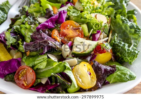 Close up of fresh organic super food salad in white bowl