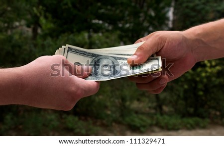 The transfer of money from one hand to another