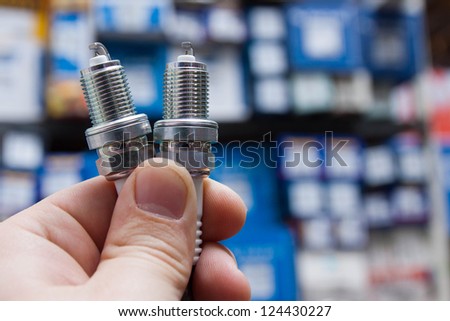 Spark plug in the hand