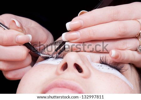 Eyelash Extensions on a black background