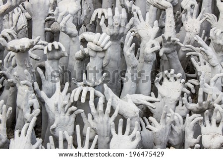 white hand form hell, Wat Rong Khun in Thailand White Temple Chiangrai