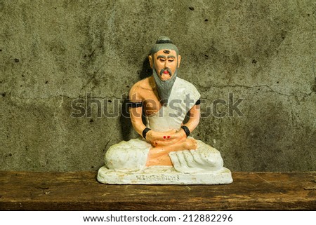 Still life with hermit Statue  , Medical Teacher of India