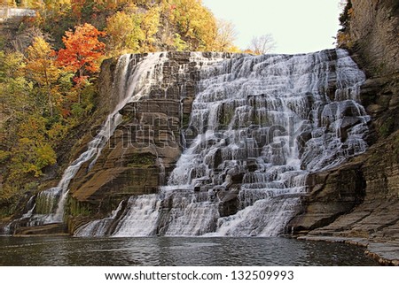View of Ithaca Falls on the campus of Cornell University, in the Falls River Gorge, in New York/Ithaca Falls in Autumn