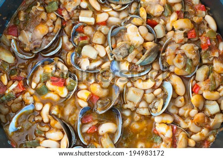 Detail of a plate of beans with clams