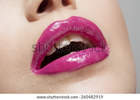 Unrecognizable woman's lips for retouch