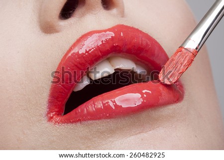 Unrecognizable woman's lips for retouch