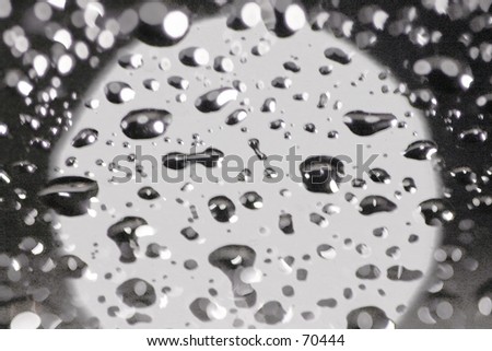 Closeup of gray cold water drops on a rainy day