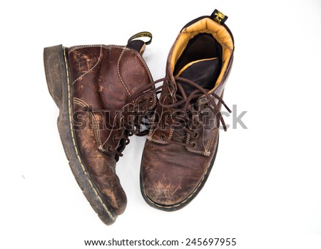 worn brown leather work boots