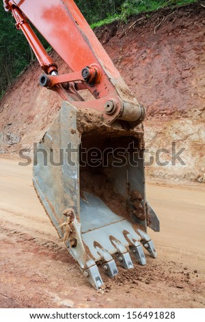 Heavy earth mover at construction site