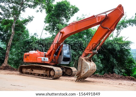 Heavy earth mover at construction site