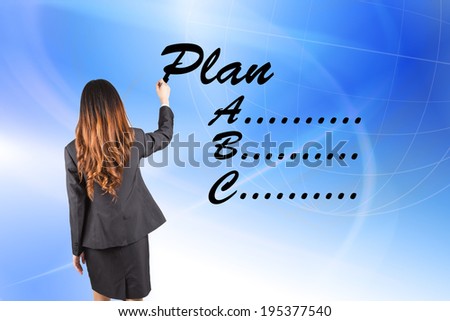 Business woman writing blank plan list.