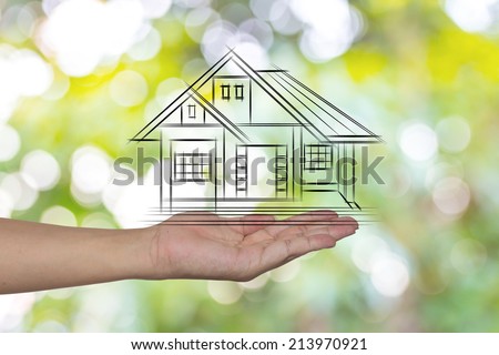 real estate, technology and accommodation concept - picture of house on virtual screen in man hand