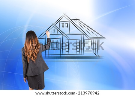 real estate, accomodation and technology concept - smiling woman drawing house on virtual screen