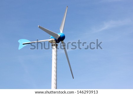 Wind turbines produce electricity for energy and the environment.