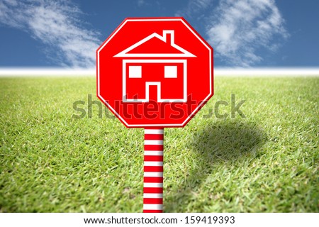 Red labels with home picture on grass in concept of this picture to Trespassing forest.