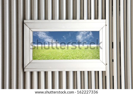 Aluminum windows on Aluminum Background and see the Picture of Natural scenery.