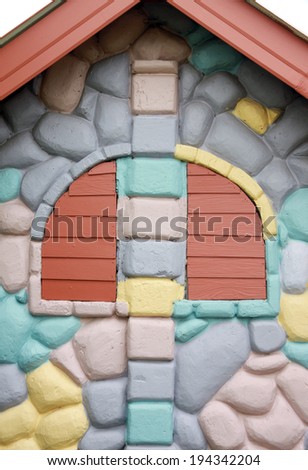Textured of windows on colorful house wall for the background.