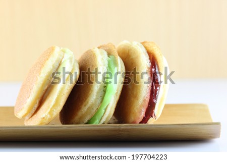 Thailand macaroon on bamboo dish for foods background.