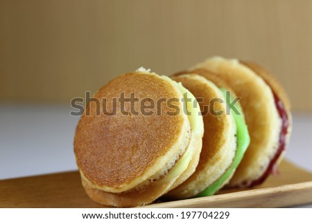 Thailand macaroon on bamboo dish for foods background.