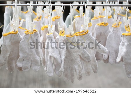 The White gloves are dry after washing.