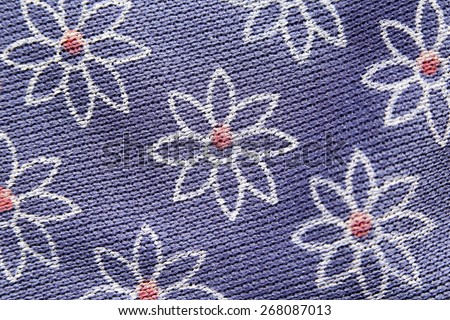Pattern flowers of purple fabric on the background.