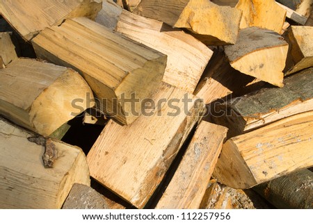 Heap of brown wooden bricks texture