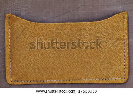 Leather pocket in the bag. Close-up. Genuine leather.